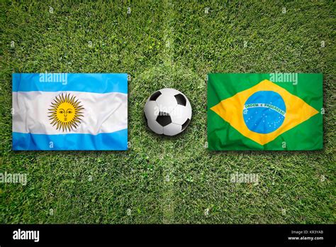 Argentina vs. Brazil flags on soccer field Stock Photo - Alamy