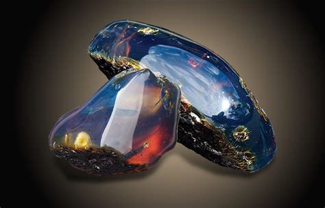 What Causes the Color Phenomena of Blue Amber?