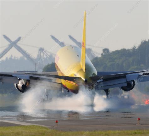 Cargo plane landing - Stock Image - C037/8522 - Science Photo Library