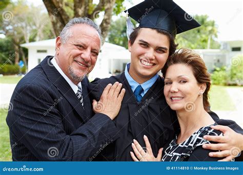 Hispanic Student And Parents Celebrate Graduation Stock Photo - Image ...