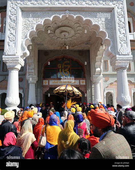 The Guru Granth Sahib, the Sikh holy book, is carried into the Guru ...