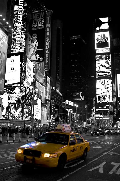 selective color photography of taxi in new york time square free image ...
