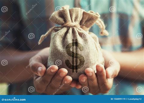 Woman Hand Holding Money Bag. Concept Saving Finance and Accounting Stock Image - Image of ...