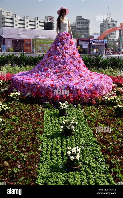 Woman gown with flowers, Flower Garden, Surat, Gujarat, India, Asia ...