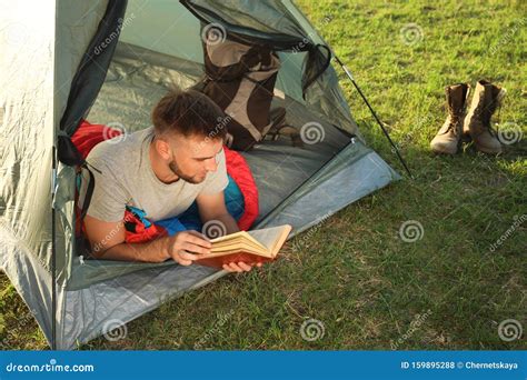 Young Man in Sleeping Bag Lying Inside Camping Tent Stock Photo - Image ...