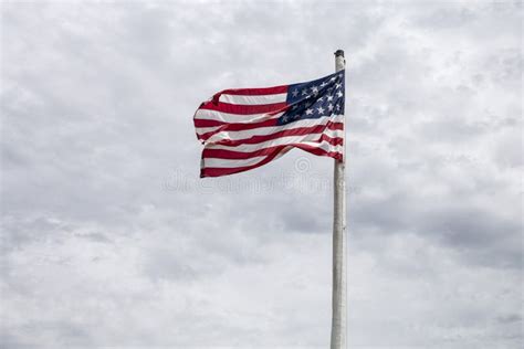 One American Flag Blowing in the Wind on a Windy Day Stock Image ...