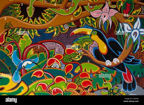 Colorful mural depicting Costa Rican wildlife outside souvenir shop ...