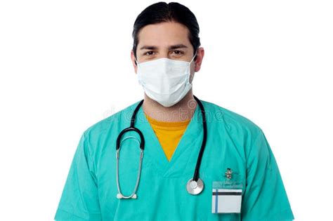 Young Male Surgeon Wearing A Face Mask Stock Image - Image of experienced, doctor: 33026991