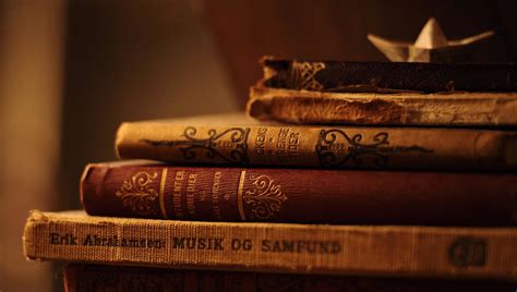 Download Vintage Aesthetic Stacked Antique Novels Book Cover Wallpaper | Wallpapers.com