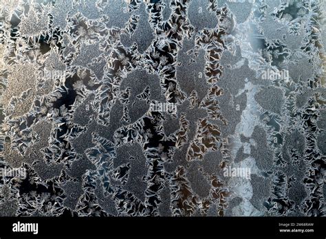 Frost on a window Stock Photo - Alamy