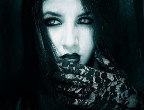 Gothic Elegance: HD Wallpaper of a Woman in Lace Gloves