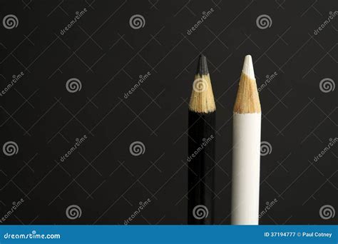 Black and White Coloured Pencil Crayons on a Black Background Stock ...