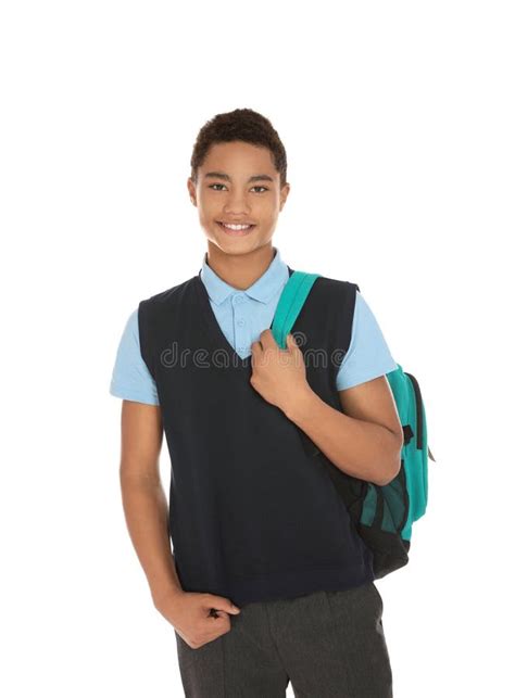 Portrait of African-American Boy in School Uniform with Backpack on ...