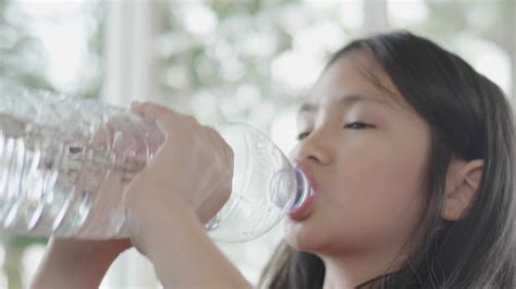 Child Drinking Water From Bottle Young Girl Stock Footage SBV-333977026 - Storyblocks