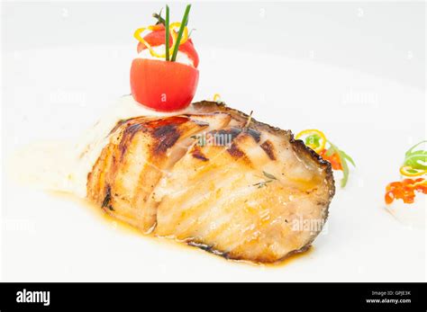 baked fish fillets Stock Photo - Alamy