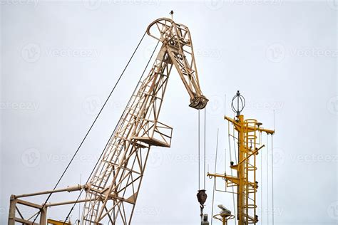 Cargo crane in container ship terminal, container yard 13406115 Stock Photo at Vecteezy