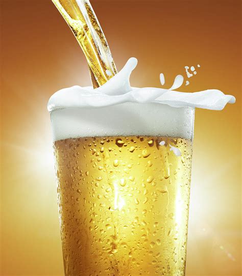 Pouring A Glass Of Beer With Foam by Jack Andersen