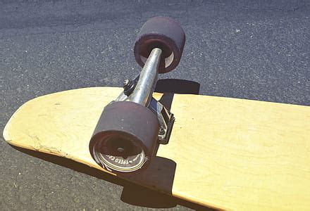 Royalty-Free photo: Person wearing grey hoodie riding skateboard | PickPik