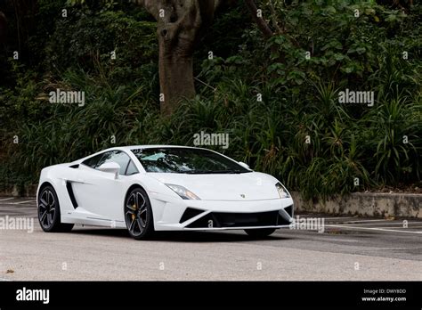 Lamborghini LP560-4 Super Car in white colour Stock Photo - Alamy