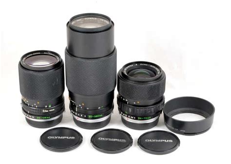 Lot 273 - Three Olympus OM Zoom Lenses.