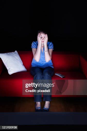 Young Woman Watching A Horror Movie High-Res Stock Photo - Getty Images