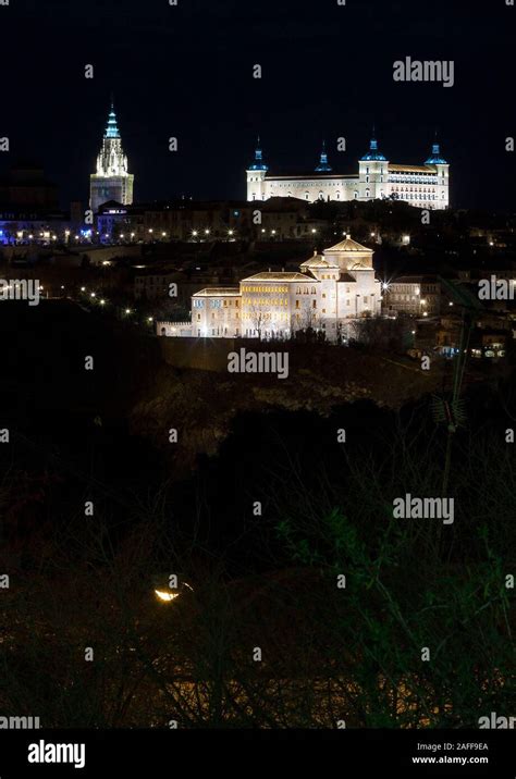 Toledo skyline by night with its most important monuments iluminated ...