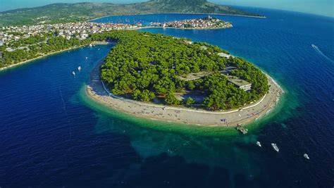 Aerial Shot Of Primosten Peninsula With Famous Beach. Stock Footage Video 12528830 - Shutterstock