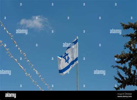 Israel's Independence Day: Israeli Flag Against Jerusalem's Skyline ...