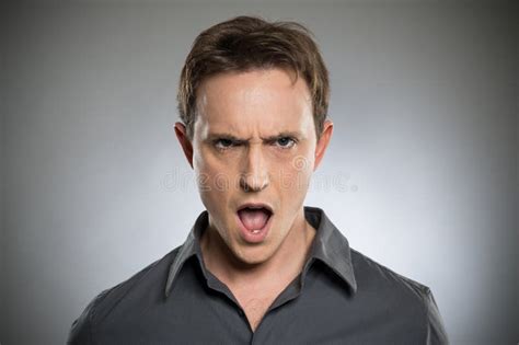 Angry Young Man Shouting stock photo. Image of negative - 39000964