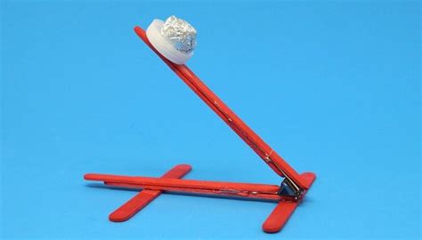 Simple Catapult with Popsicle Sticks and a Spoon | Popsicle stick ...