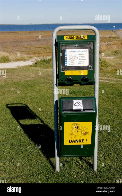 Dispenser with bags for dog faeces hi-res stock photography and images - Alamy