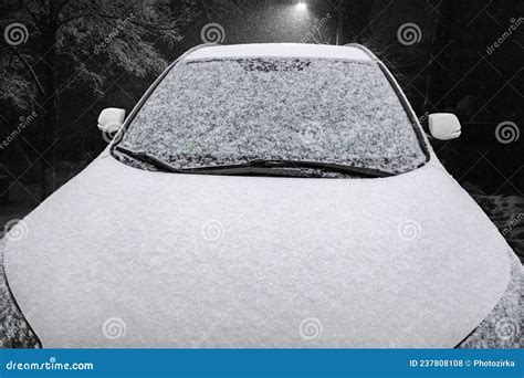 Passenger Car Covered with Snow at Night Stock Photo - Image of ...