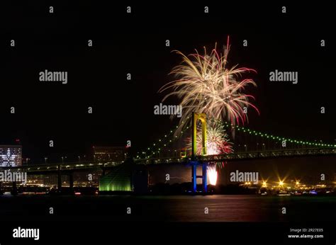 Rainbow Bridge and the Odaiba rainbow fireworks Stock Photo - Alamy