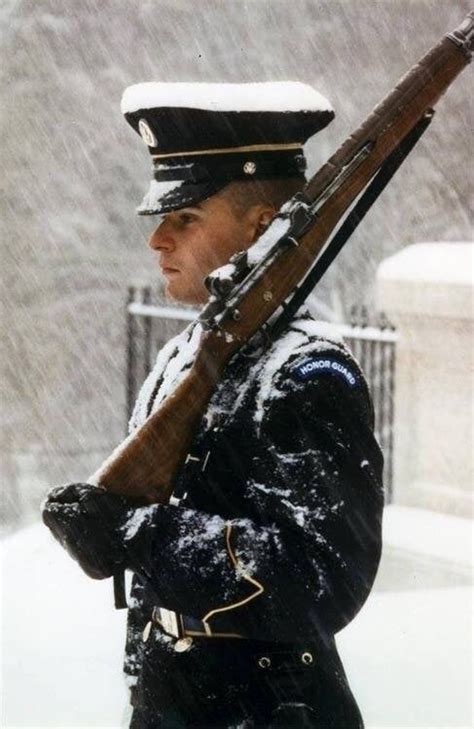 Rain, snow or shine. Tomb Sentinels stand guard at the tomb of the ...