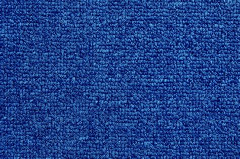 Premium Photo | Close up of dark blue color carpet texture background with seamless pattern.