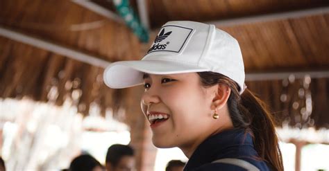 Woman in White Baseball Cap and Black Shirt · Free Stock Photo