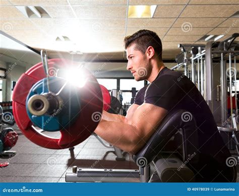 Biceps Preacher Bench Arm Curl Workout Man at Gym Stock Image - Image of bench, adult: 40978039