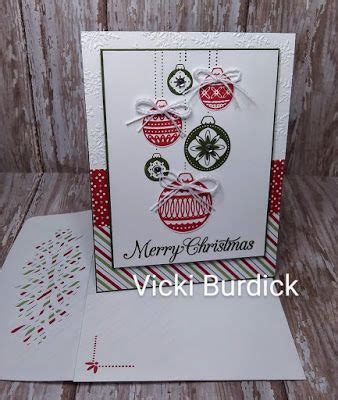 a christmas card with ornaments on it