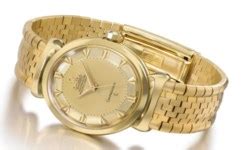 Omega. A fine 18K gold automatic wristwatch with sweep centre seconds ...