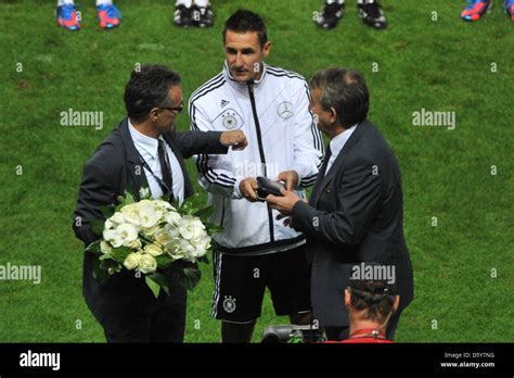 Germany's Miroslav Klose (C) receives Fair-Play Award from Wolfgang ...