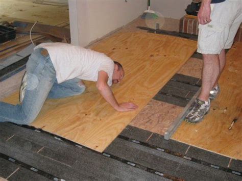 How to Level a Plywood or OSB Subfloor Using Asphalt Shingles ...