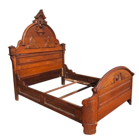 Antique Eastlake Victorian Heavily Carved Walnut Full Size Bed with Jester Face - Scranton Antiques