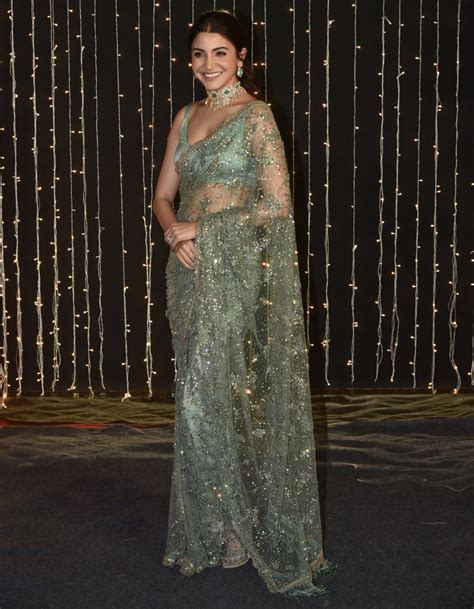 Going for a friend’s wedding reception? Wear Anushka Sharma’s green Sabyasachi sari