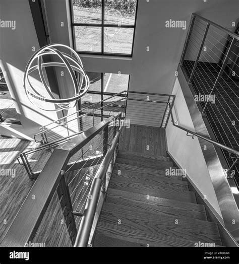 Architectural interior featuring custom metal hand rails Stock Photo - Alamy