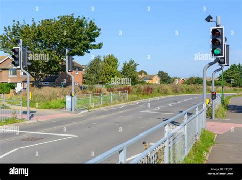 Toucan crossing for pedestrians and cyclists on a road in England UK Stock Photo - Alamy