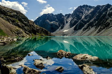 Lying at 3560m, Lake Ala-Kul - the turquoise pearl of the Tien Shan mountain range, Kyrgyzstan ...