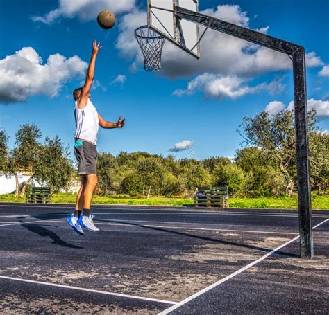 Baby Hook Shot in a Basketball Playground Stock Image - Image of background, ball: 106154975