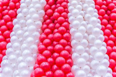 Premium Photo | Red and white balloons background.