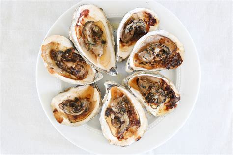 Grilled Oysters with Lemon Butter Sauce • Harbor Fish Market