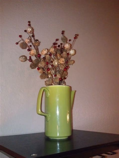 antique green coffee pot filled with sprigs of holly | Flickr